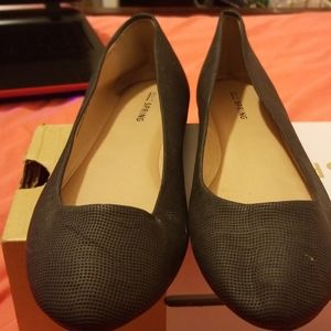 Black flats with gold trimming